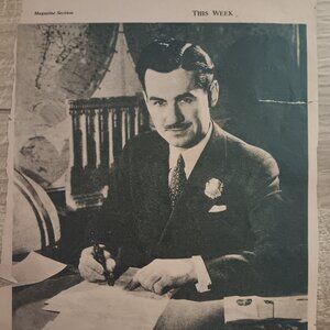 1936 Lowell Thomas reading writing picture from the Cleveland Plain Dealer